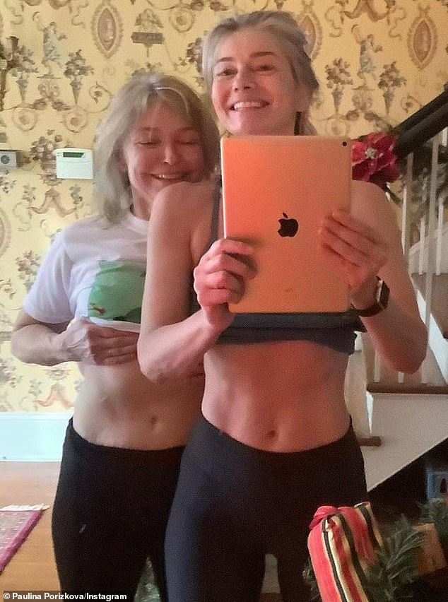 She got it from her mama!  Paulina and her mom Anna, 74, flashed their impressive abs after working up a sweat during a virtual Nofar Method pilates class on Monday
