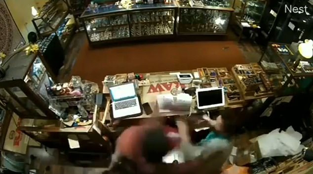 Covington marched into the shop and went behind the counter, knocking her to the ground and putting his arm around her neck before trying to steal items from the business