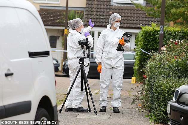 Forensic teams were also pictured outside the property in Milton Keynes in October 2019