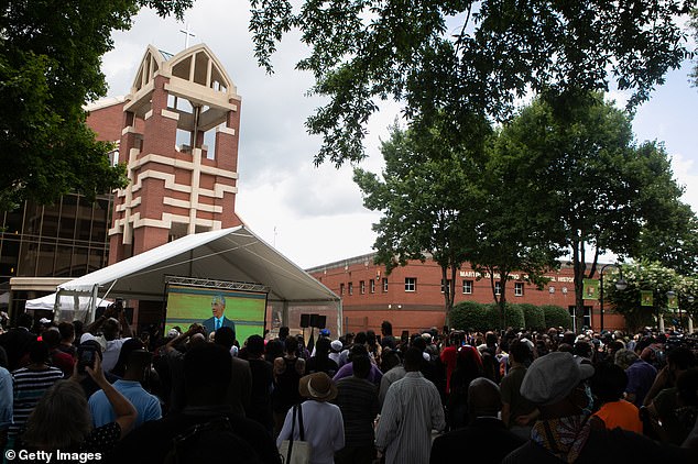 In 2013, Warnock delivered the benediction at the public prayer service at President Barack Obama's second inauguration. Obama is pictured giving the eulogy at the funeral service for the late Rep. John Lewis at Ebenezer Baptist Church on July 30, 2020