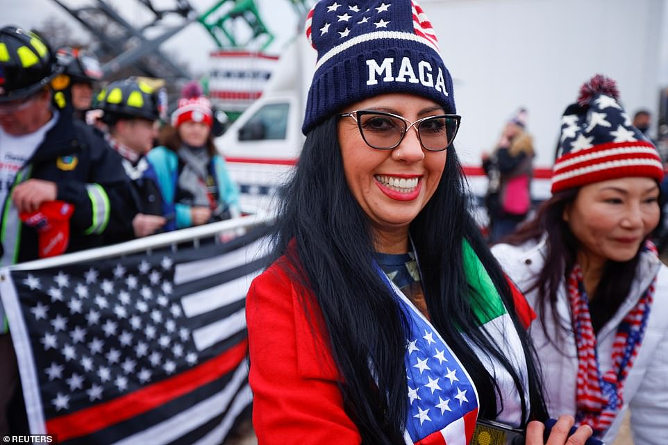 Supporters of President Trump brandish American flags and sport pro-Trump paraphernalia in Washington, DC, on Wednesday