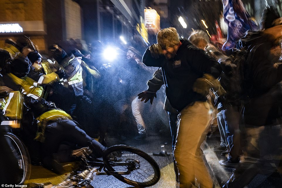 Police and protesters scuffled on the streets of Washington DC on Tuesday night