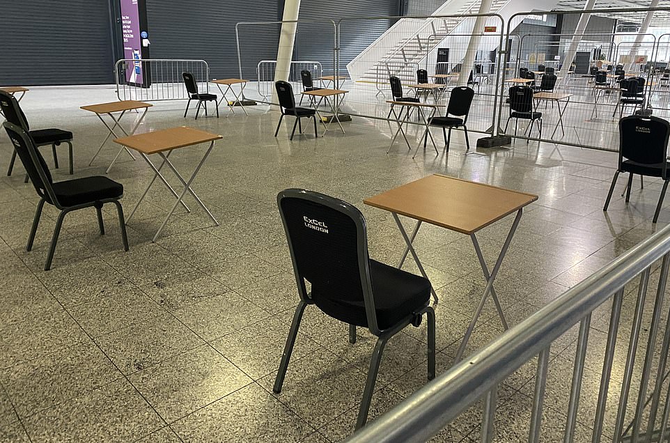 Above are pictures from inside the Excel Centre last month. They show tables and chairs laid out, possibly in preparation for the roll out of the vaccine