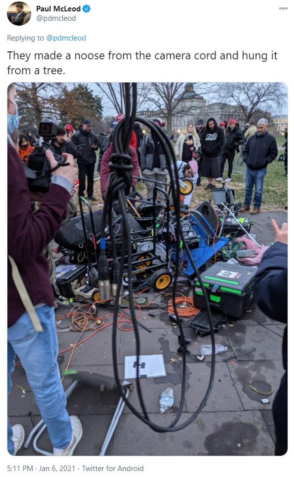 Some of the crowd then made a noose from the camera cord and hung it from a tree, according to Buzzfeed reporter Paul McLeod
