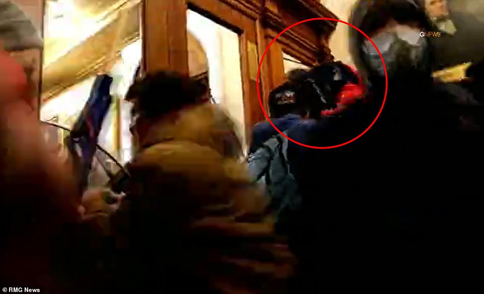 Video showed Babbit climbing through a broken window seconds before she was shot