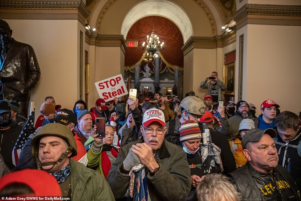 The mostly maskless crowd flooded the halls of the Capitol with little resistance from police