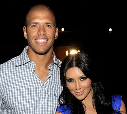 Romance: Moving on from Reggie, Kim fell into the arms of another NFL player, Miles Austin who she dated from June to September 2010 (pictured July 2010)