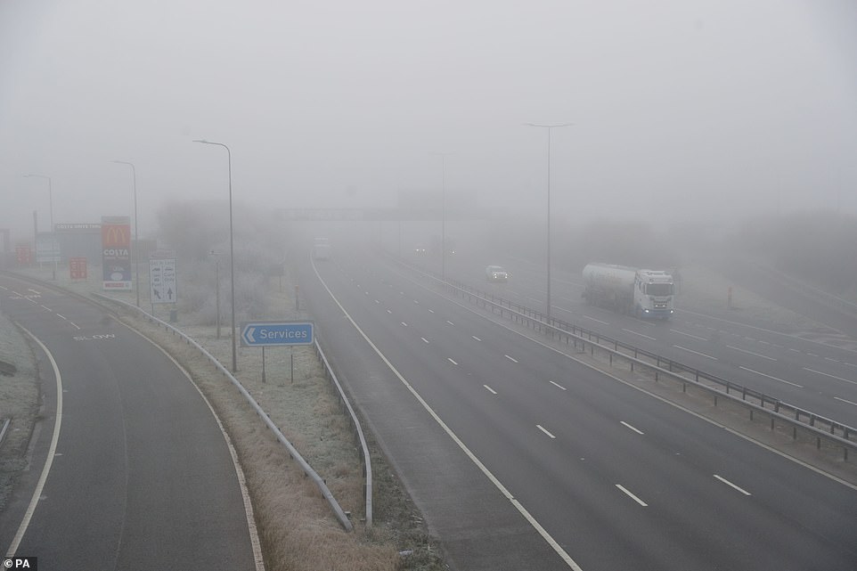 Fog has cut visibility on the M5 Worcester, West Midlands where a yellow weather warning for ice is in place throughout today