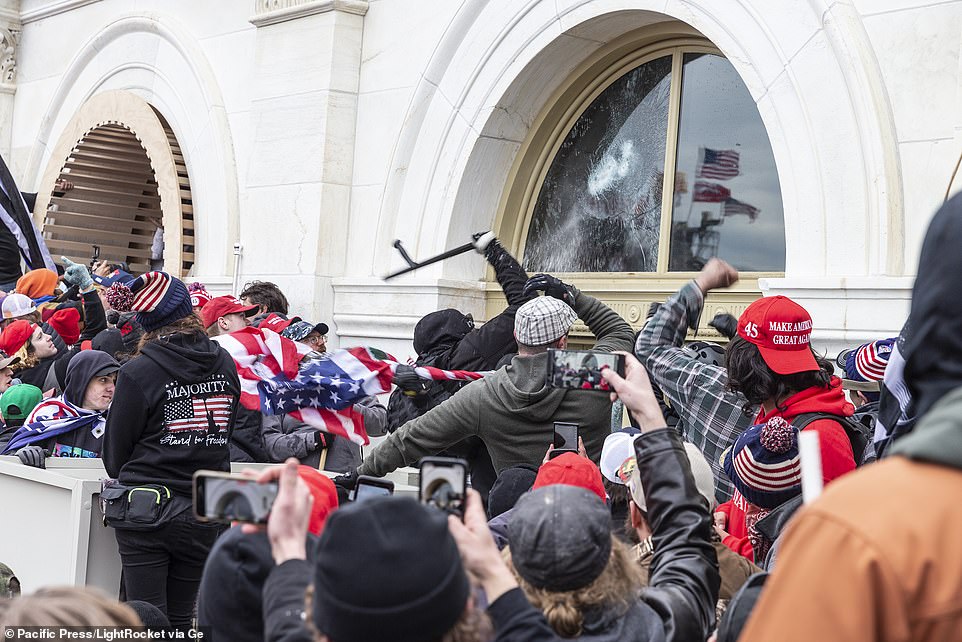 Pro-Trump protesters break windows of the Capitol building. Rioters broke windows and breached the Capitol building in an attempt to overthrow the results of the 2020 election