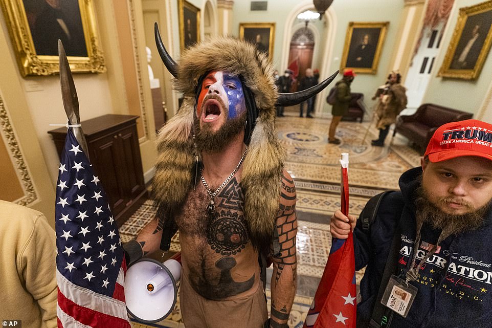 Supporters of US President Donald Trump enter the US Capitol on January 6, 2021, in Washington, DC