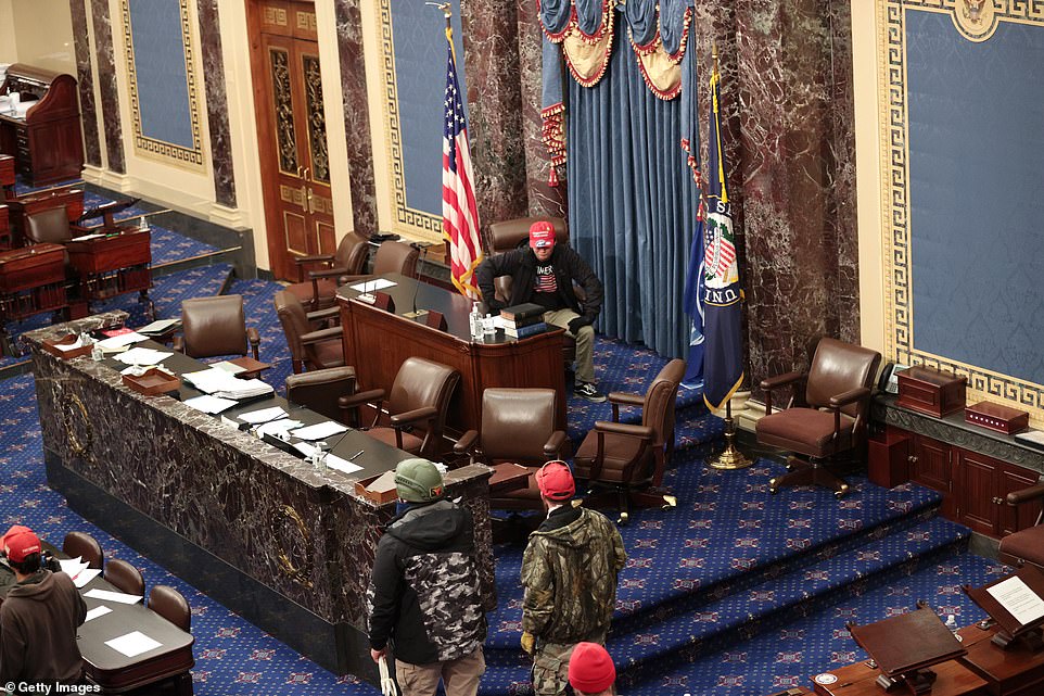 Demonstrators storm the Senate Chamber on January 06, 2021 in Washington, DC