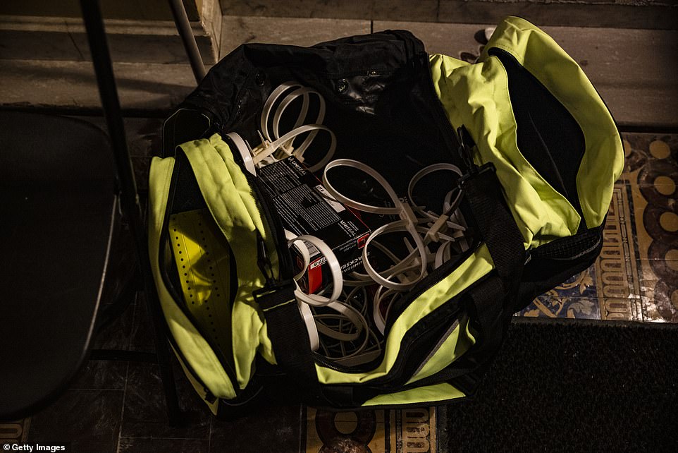 A duffle bag of flex cuffs remains at the northern entrance door