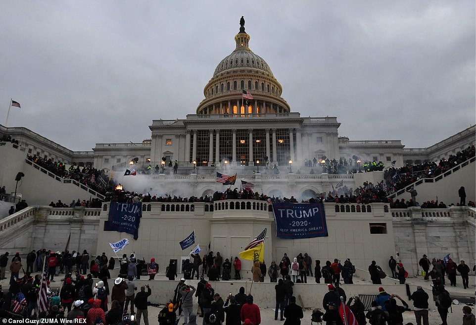Supporters of President Donald Trump breech the U.S. Capitol as election results are to be certified in Washington DC on January 6, 2021 after breezing past cops