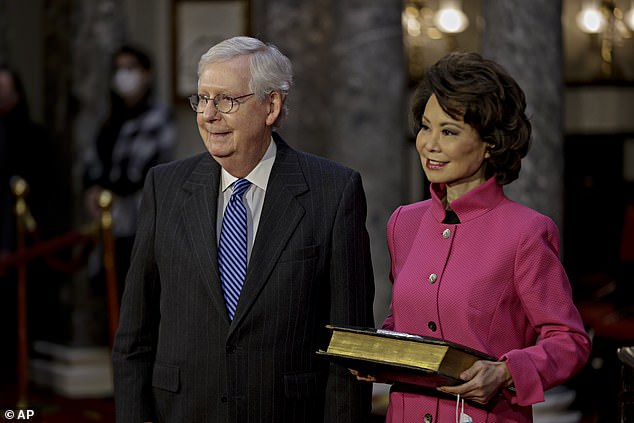 Transportation Secretary Elaine Chao, who is married to Senate Republican Leader Mitch McConnell (above together), also resigned Thursday