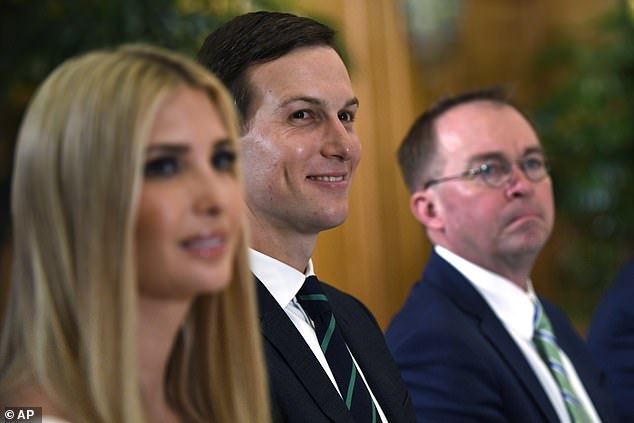 White House adviser Jared Kushner, center, flanked by his wife Ivanka Trump, left, and acting Chief of Staff Mick Mulvaney, right, attend a dinner with President Donald Trump and Australian Prime Minister Scott Morrison in Osaka, Japan. He said his legacy would now be identified with 'the guy who tried to overtake the government'