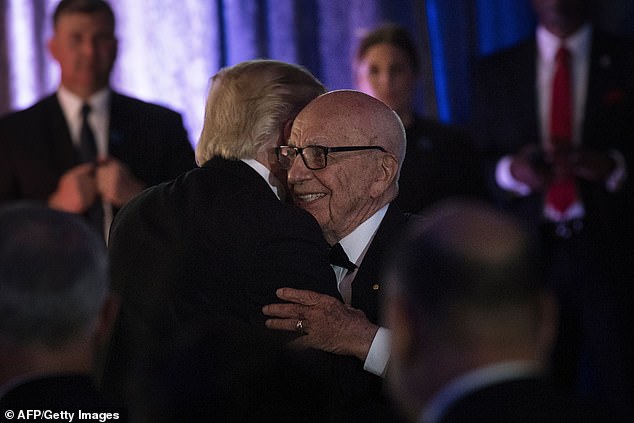 Rupert Murdoch is pictured embracing Trump in May 2017 but has since turned on him