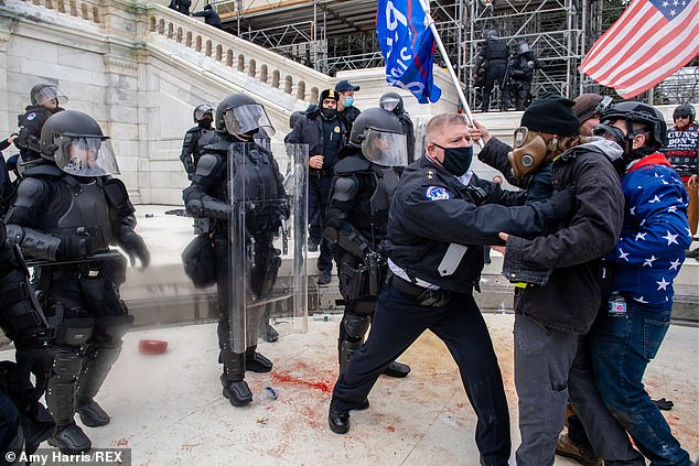 Trump supporters face off with police at the Capitol Building following the 'Stop The Steal' rally where they assembled to protest the 2020 election results