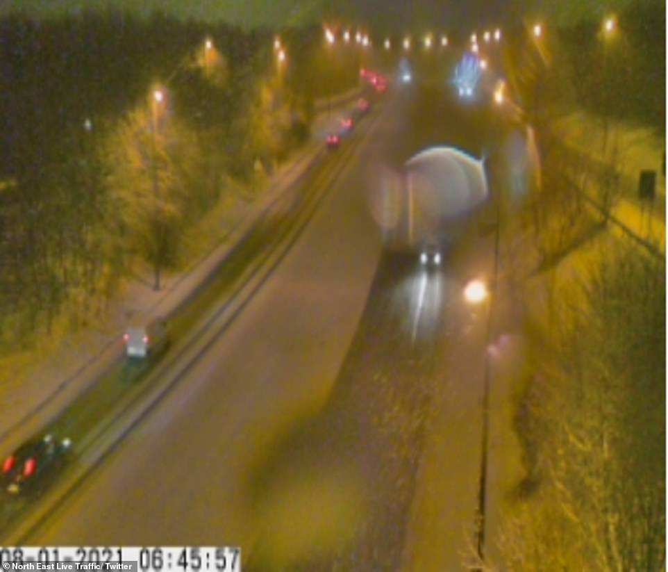 Traffic cams show snowfall on the roads early this morning as authorities warned drivers to take care behind the wheel