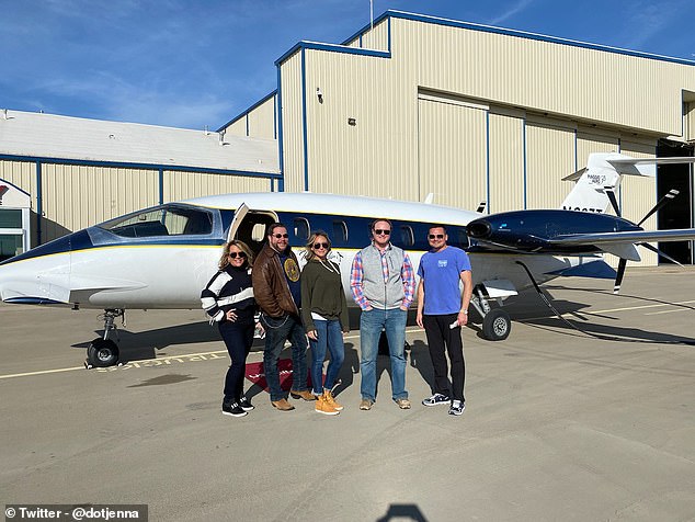 The group, including Ryan (left), posed for a picture in front of the private jet they hired to take them from Denton, Texas, to the capital to join the rally