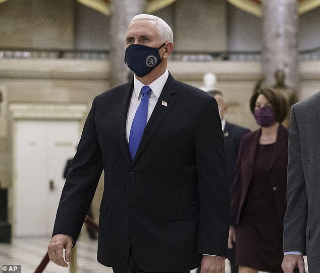 Pelosi applied pressure to Vice President Mike Pence and urged him to invoke the 25th Amendment to remove Trump from office. Both Democrat leaders called Pence to demand Trump's removal from office - but were put on hold. Pence is pictured Thursday being escorted to the House Chamber