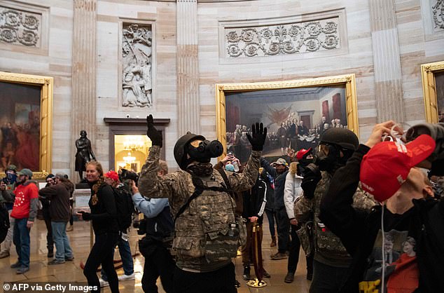 Trump su
pporters marched through the Capitol Rotunda after breaching what appeared to be flimsy security - a stark contrast with the heavy-handed crackdowns that Trump ordered against Black Lives Matter protesters last summer