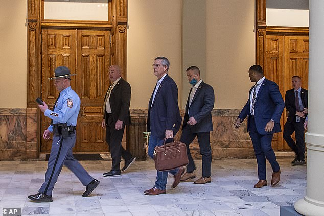 ATLANTA: Georgia Capitol Police escorted Georgia secretary of state Brad Raffensperger (above) and his staff out of the building shortly before 3pm
