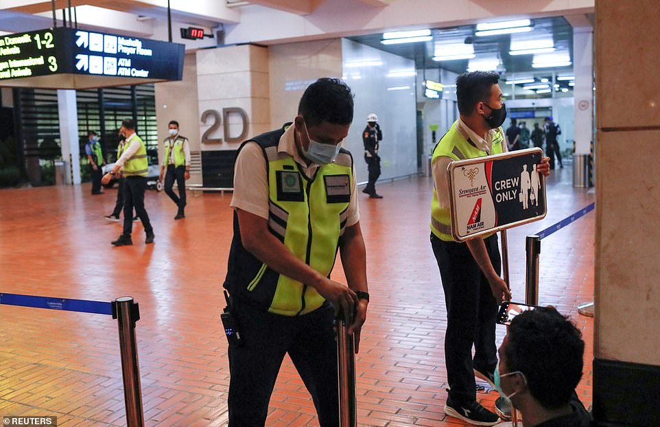Airport officials installed barriers at Soekarno-Hatta International Airport after the Sriwijaya Air flight SJ182 went missing