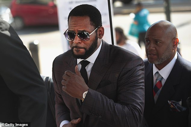 Disgraced: The Chicago-born R&B musician is awaiting his case to go to trial in Brooklyn, New York in early April; seen in Chicago in June 2019