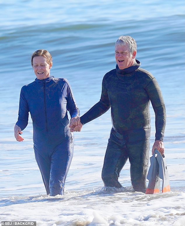 It's true love: Also present was Sigourney's longtime husband who wore a wet suit and carried flippers in his left hand. He also held hands with his wife, in a sweet show of unity after nearly four decades together