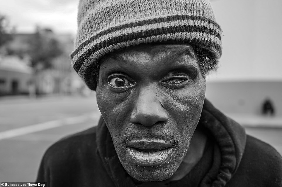 Pictured: A man with only one eye poses for the camera on Skid Row. Skid Row is the location of one of the largest stable populations of homeless people in the U.S. with over 5,000 inhabitants, 3,000 of which sleep in tents or on the sidewalk