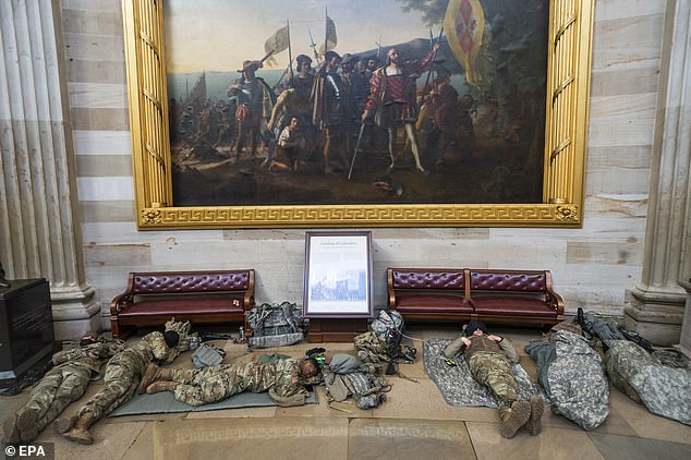 Troops were called in following the Capitol breach last week and by the end of the week there will be 10,000 National Guard members in Washington D.C. Some are shown spreading out inside the Rotunda of the U.S. Capitol on Wednesday morning