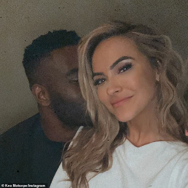 Moving on: Though the divorce has undoubtedly been a difficult time for both of them, Chrishell and Justin have each entered into relationships in recent months; Chrishell pictured with beau Keo Motsepe in December 2020