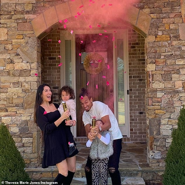 Congrats! In one snap, Theresa stood outside of her home with her husband and children as they shot a colorful cannon into the air and revealed a baby girl was on the way