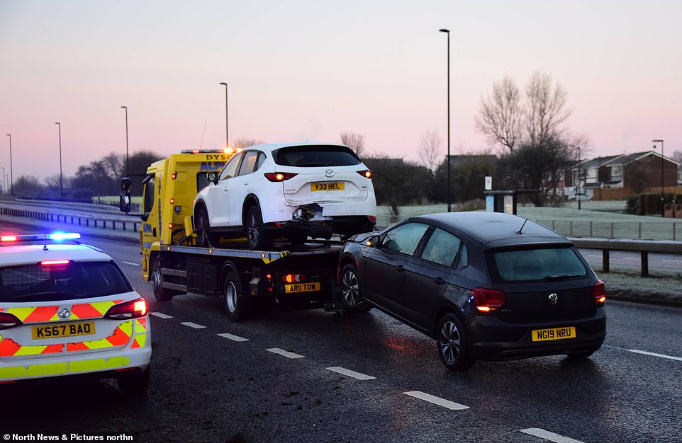 Vehicles being towed away and cars on the side verges in the Wallsend area of North Tyneside this morning