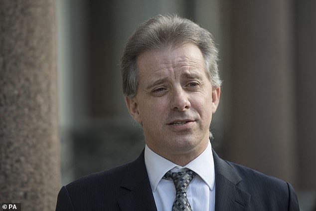 An unnamed FBI agent who was British ex-spy Christopher Steele's (above) handler admitted that it was immediately apparent that Steele's 'dirty dossier' was 'political.'