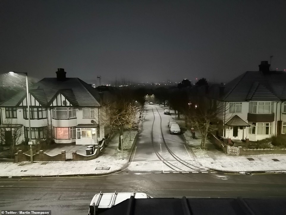 Drivers on the roads in the early hours warned of treacherous conditions on the M40 towards London. One Twitter user wrote: 'Horrendous journey into London. Crashed car across carriageway north of Cherwell Services on M40. (Called police). Further south, carriageway surface danger
ous with falling snow.' Pictured, a snow-covered London street