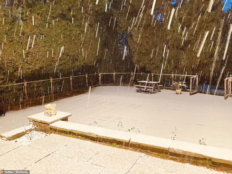 A patio and garden was completely covered in the white stuff in Enfield, London, early Saturday morning