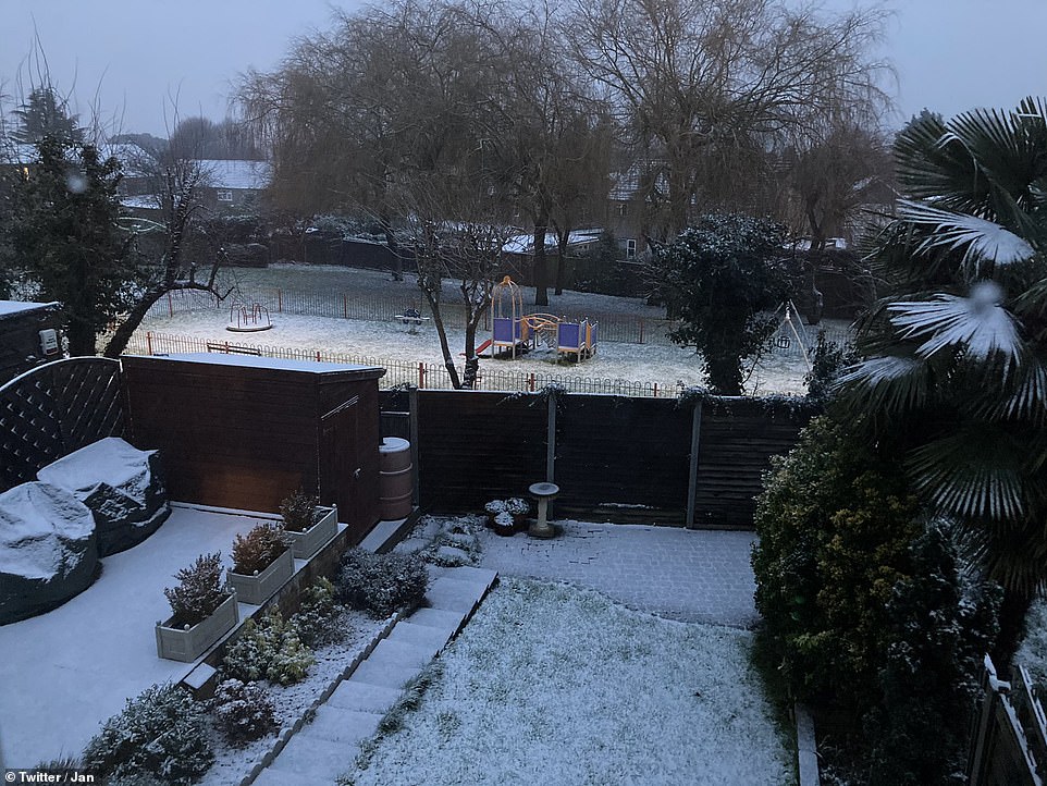 A garden was covered in a light coating of snow in Chesham, Buckinghamshire, early Saturday morning