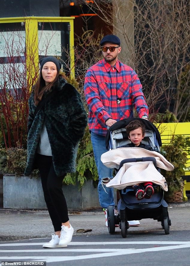 The couple - who have been dating since 2007 - are pictured out in New York with son Silas in February. Biel would have been around three months pregnant at the time