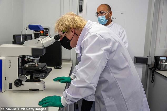 Boris Johnson was shown the vaccine quality control systems on a visit to Oxford Biomedica in Oxfordshire today