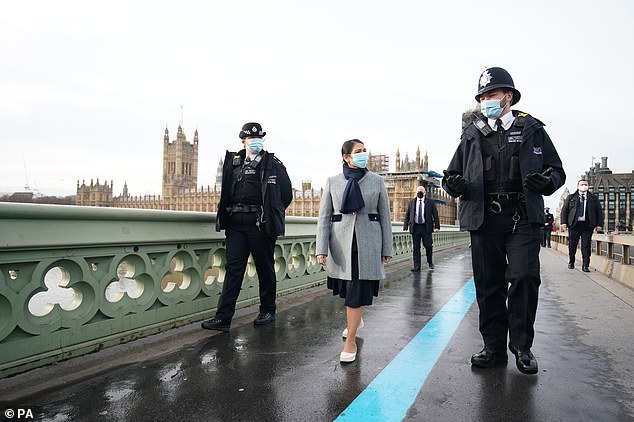 Home Secretary Priti Patel today vowed tougher enforcement on lockdown-sceptic protests as she chatted to police officers in Westminster