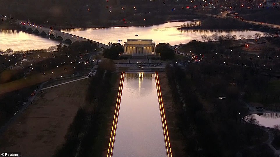 An illuminated Reflecting Pool is seen in the above aerial image during Tuesday evening's ceremony