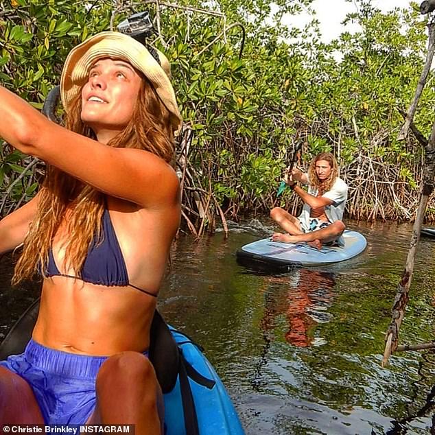 Pals: The star was checking out some of the sea fauna with her daughter Sailor's beau Ben Sosne and her son Jack's supermodel girlfriend Nina Agdal