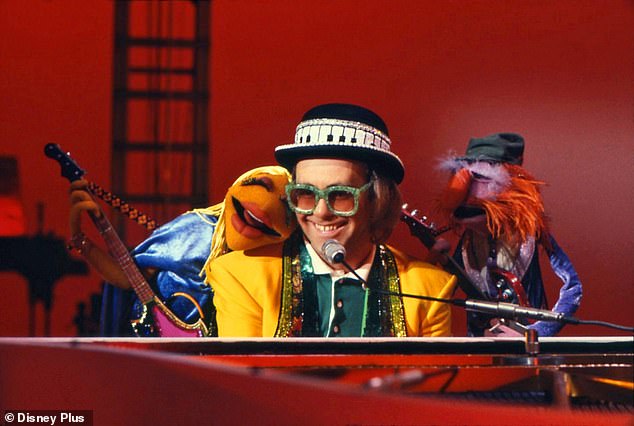 Tiny dancers: Elton John - who's an Emmy away from EGOT status - played the piano with Dr. Teeth and The Electric Mayhem's lead guitarist Janice and bass playe
r Floyd Pepper in 1978
