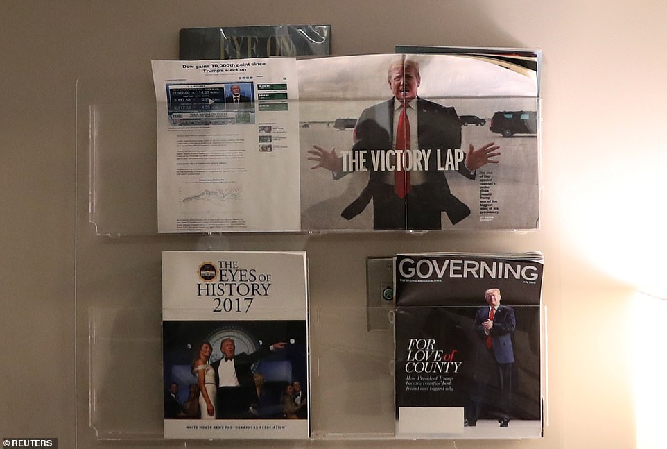 In the Low
er Press Office, staffers left behind magazines with Trump on the cover
