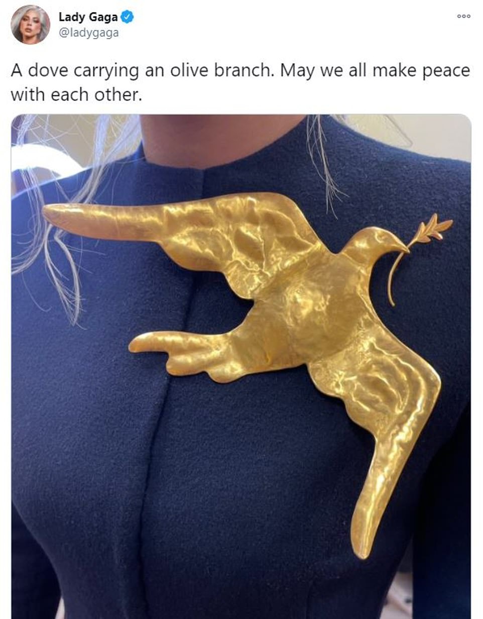 Gaga later explained her decision to wear a dove - a symbol of peace - on Twitter: 'A dove carrying an olive branch. May we all make peace with each other'