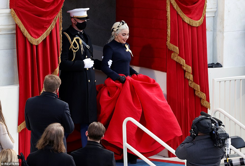 Singer Lady Gaga arrives for the inauguration ans walks down the West Front of the US Capitol