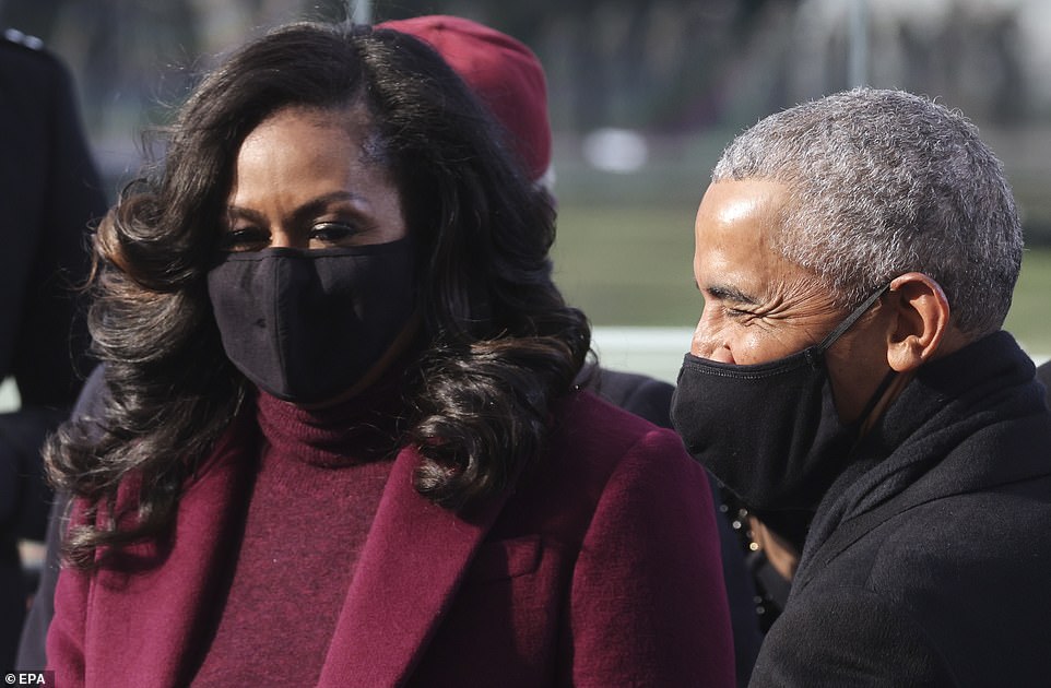 Hairdo: : Mrs. Obama's dark hair was sided-parted and styled in loose curls for the swearing-in ceremony