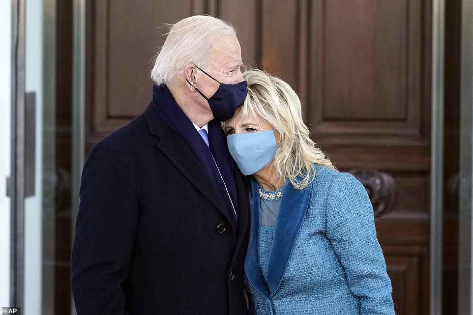 Biden got to work soon after making a grand entrance into the White House Wednesday, walking hand-in-hand with First Lady Jill Biden to their new home and saying: 'It feels like I'm going home'