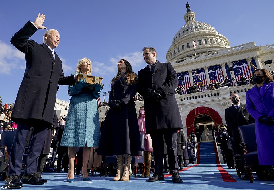 Joe Biden raised his hand and took an oath to 'preserve, protect and defend' the Constitution on Wednesday ¿ starting his tenure amid a pandemic and putting an end to a tumultuous four-year term by President Donald Trump
